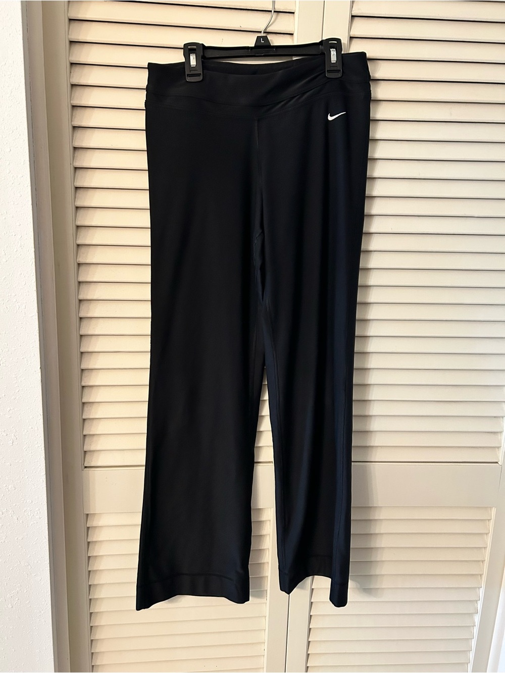 Nike Black Women's Boot-Cut Athletic Pants with White Swoosh